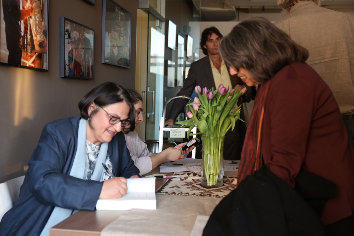 Dr. Ella Shohat signs copies of her book